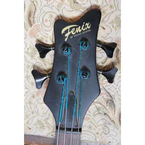 183 - A Fenix short scale bass guitar, the natural wooden body fitted with single pick up