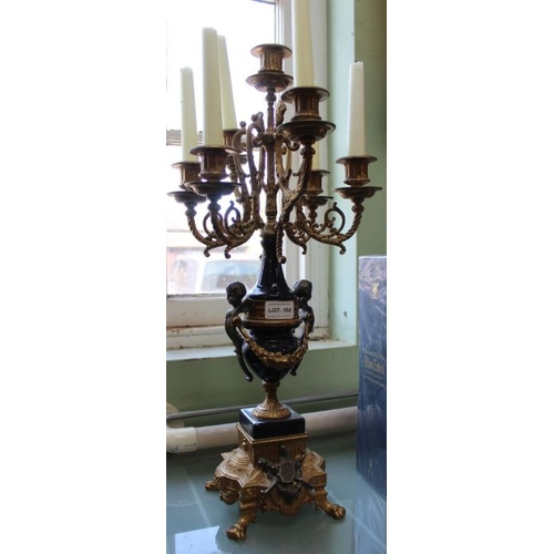 184 - A French decorative brass and blue table candelabra