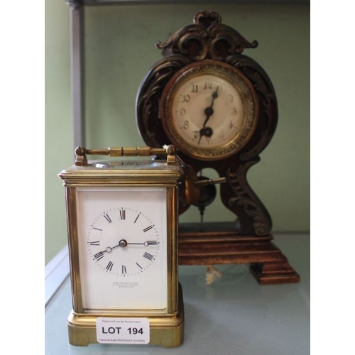 194 - An Art Nouveau design probable German mantel timepiece together with a brass carriage clock, the ena... 