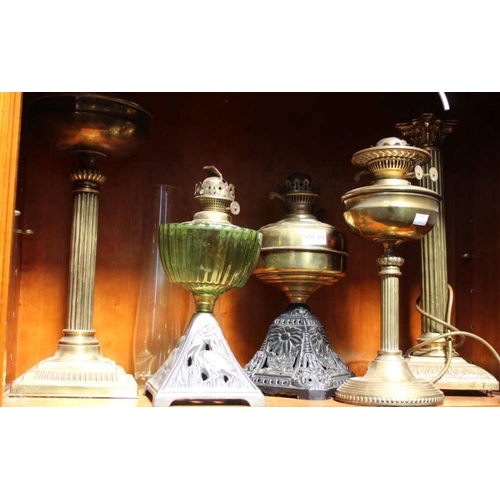 210 - A selection of  brass lamps