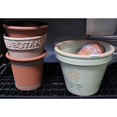 222 - A small selection of terracotta pots with risers