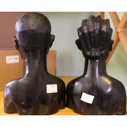 246 - A pair of hand carved African hardwood busts