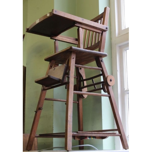 28 - A Vintage metamorphic wooden child's high chair