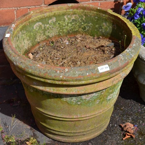 304 - A well weathered terracotta garden planter, 43cm high, 52cm in diameter