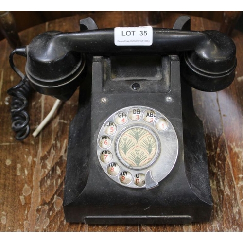 35 - A vintage Bakelite dial telephone, model 164 TE 45/1