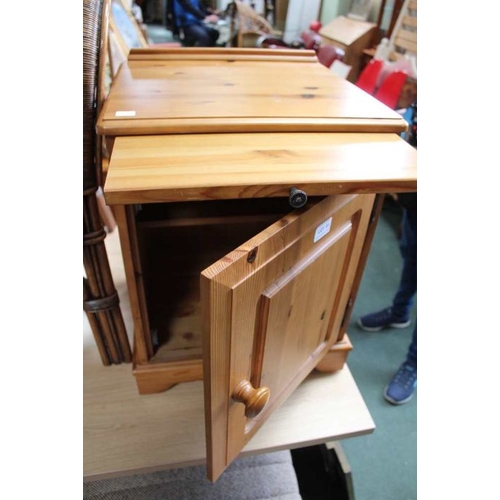 36 - A pine bedside cupboard.