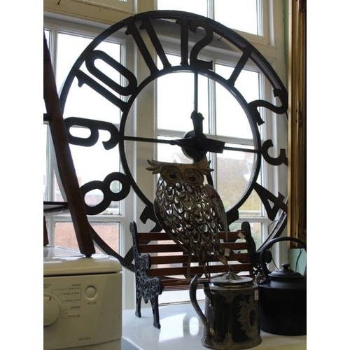 37 - An oversized electric wall clock, illuminating around the inner dial 105cm dia