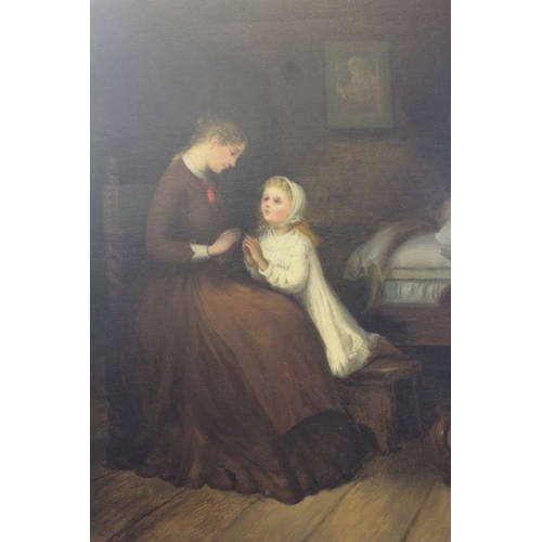 38 - An original oil painting of a mother and child praying within fancy gilt frame