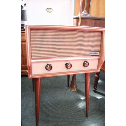 39 - An original mid-century two tone Dansett floor standing record player, supported on four tapering le... 