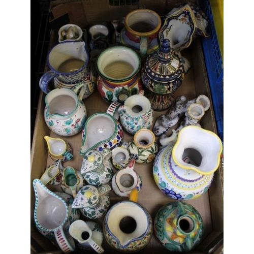 59 - A quantity of Continental Faience and Majolica items, mostly jugs and vases