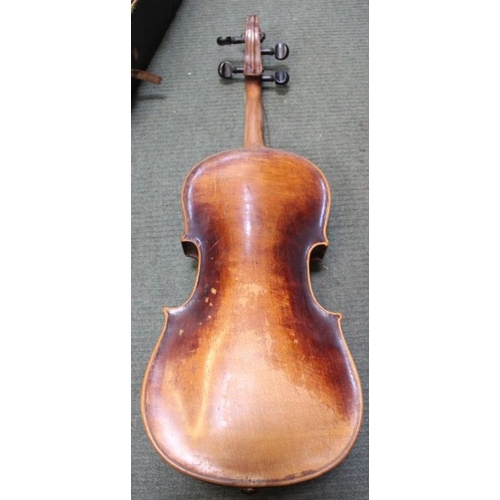 70 - An unnamed antique violin having one piece back with a mid 20th century unnamed bow i the remains of... 