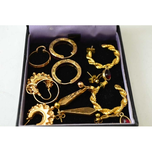 118 - A collection of six pairs of gold and yellow metal earrings