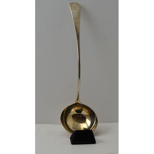 14 - An 18th century silver soup ladle, gilded interior to the bowl. Old English pattern handle, with eng... 