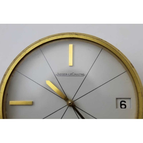 151 - Jaeger Le Coultre desk clock, brushed brass case, baton markers at the quarters, date aperture at 3 ... 