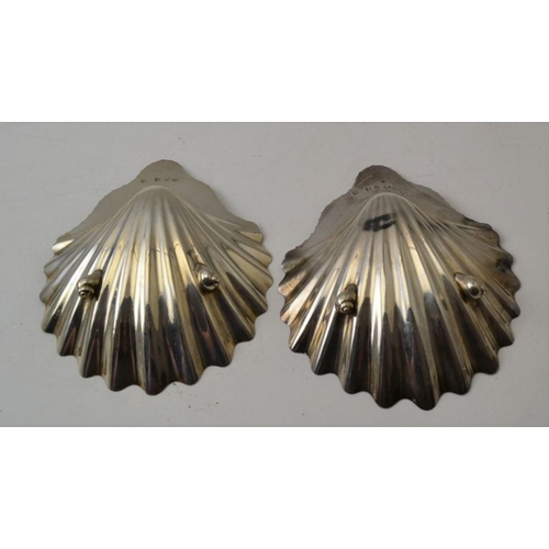 16 - Charles Aldridge and Henry Green, a pair of George lll silver scallop form dishes, raised on shell f... 