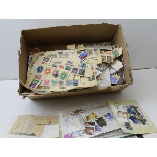 162 - A large box of many hundreds of World stamps