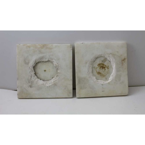 193 - Two marble and alabaster lotus floral rosettes, the bases 20cm square