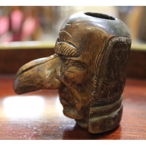 194 - 19th century hard wooden pipe bowl in the form of a large nosed gentlemen 7.5 cm high with a 19th ce... 