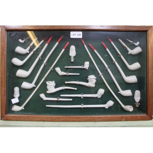 225 - A framed clay pipe collection plus a continental porcelain 3-d plaque in gilt frame