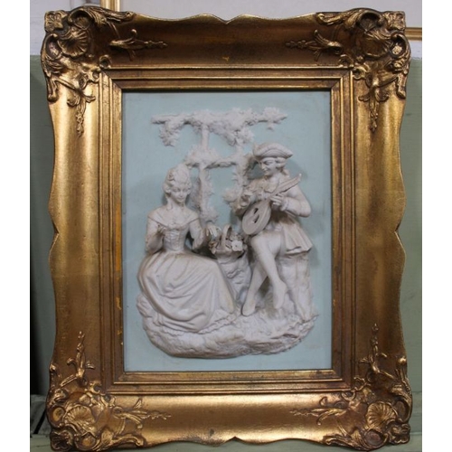 225 - A framed clay pipe collection plus a continental porcelain 3-d plaque in gilt frame