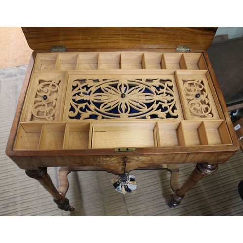 248 - A 19th century inlaid walnut worktable the lift up lid revealing fitted interior four turned legs un... 