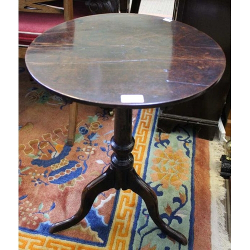 308 - An early 19th century mahogany circular tilt top table on cannon barrel column & three downswept leg... 