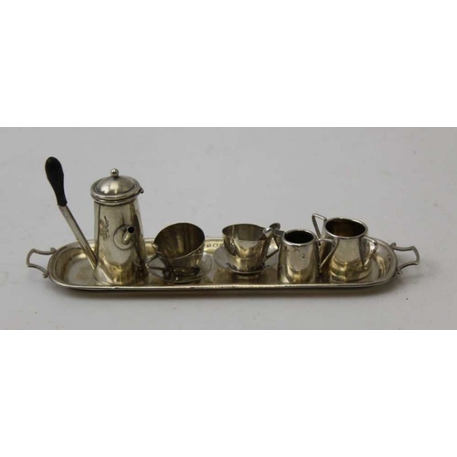 32 - Levi & Salaman, a miniature silver coffee set, Birmingham 1908
