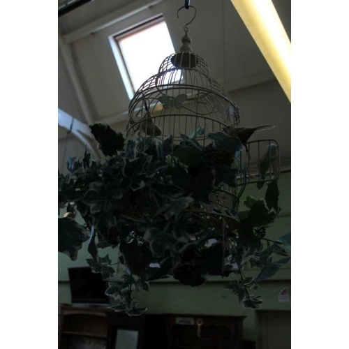 325 - A decorative hanging wirework birdcage, with additional foliage