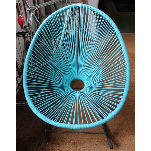 333 - A retro design metal based rocking chair, with aquamarine rubberised webbing