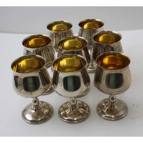 34 - A set of eight silver goblets, gilded interiors commemorating The Silver Wedding Anniversary of HRH ... 