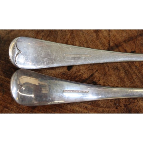 37 - A Georgian silver toddy ladle, the bowl inset a George II coin, having twisted whalebone handle, tog... 