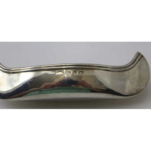 51 - A late Victorian silver canoe, Birmingham 1899, 12.5cm, together with an Exeter 1827, silver caddy s... 