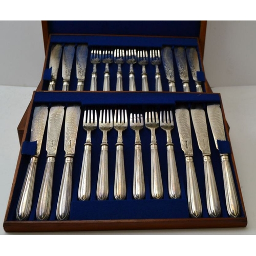 59 - A Victorian mahogany canteen of silver plated fish knives & forks, with engraved decoration, for 18 ... 