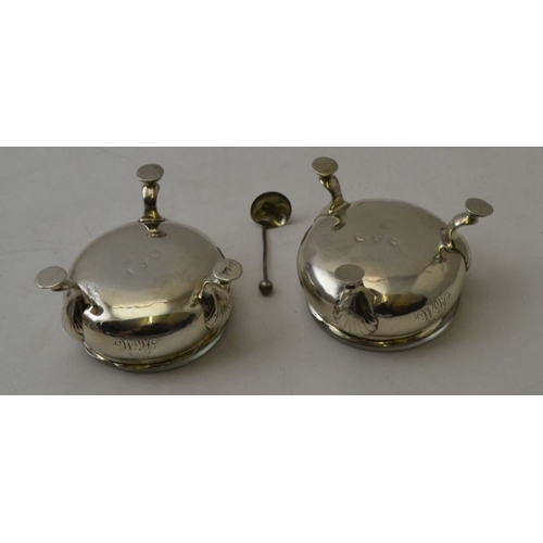 68 - A pair of silver George II salts, raised upon three, scallop knee pad supports, London 1753, engrave... 