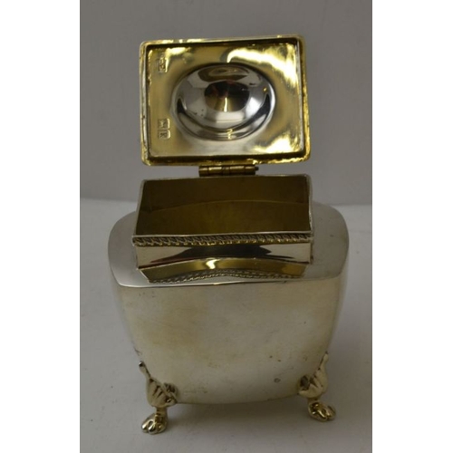 70 - Mappin & Webb, an Edwardian silver tea caddy, with hinged lid raised on paw feet, London 1905, 184g