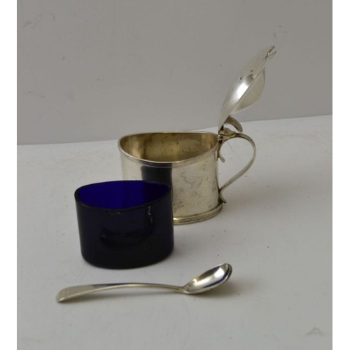 71 - Mappin Brothers. A late Victorian silver mustard, of Georgian design, Sheffield 1896, with blue glas... 