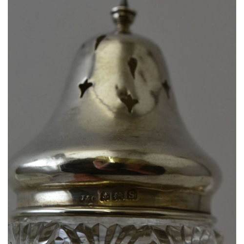 91 - A collection of silver mounted glass items, includes; two grenade scents, a sugar caster, and a cand... 