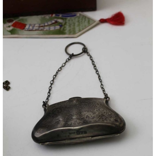 93 - A Victorian silver purse, a watch chain, with propelling pencil mounted, various pocket watches, etc... 