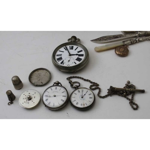 93 - A Victorian silver purse, a watch chain, with propelling pencil mounted, various pocket watches, etc... 