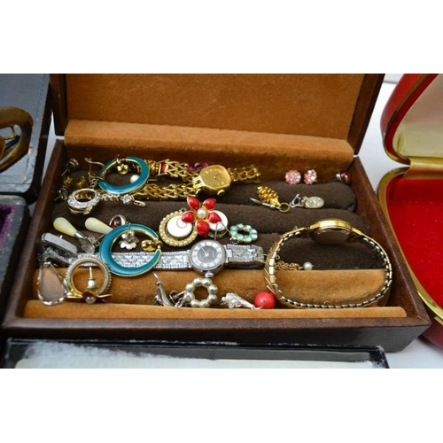 94 - A collection of costume jewellery, includes; pairs of earrings, watches, brooches, necklace, etc.