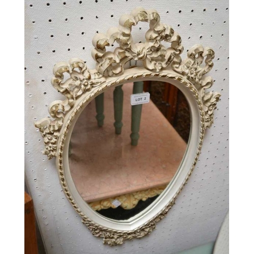 106 - A Marie Antionette style carved mirror