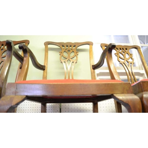 11 - Ten fancy pierced backed dining chairs, with upholstered drop in seat pads, to include a set of six,... 