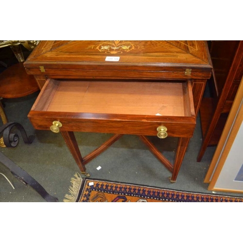 128 - A late 19th early 20th century inlaid rosewood envelope card table with single drawer four plain tap... 