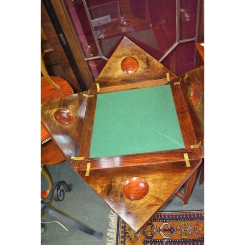 128 - A late 19th early 20th century inlaid rosewood envelope card table with single drawer four plain tap... 