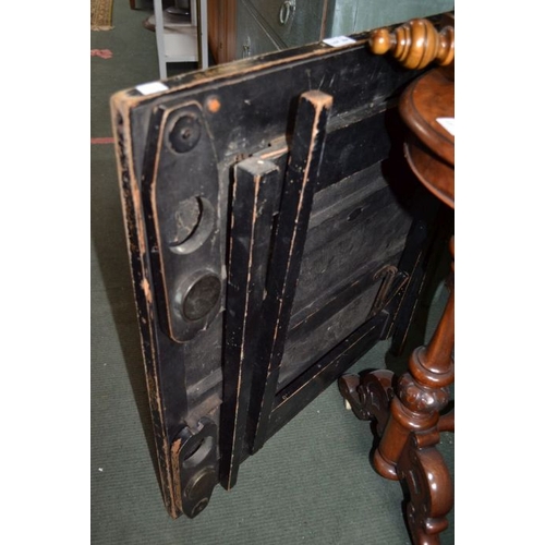 167 - 1920's black folding card table with drinks holders and counter pots