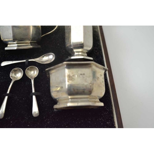 268 - William Neale & Son Ltd. A cased silver condiment set, the pieces of octagonal form, comprising; two... 