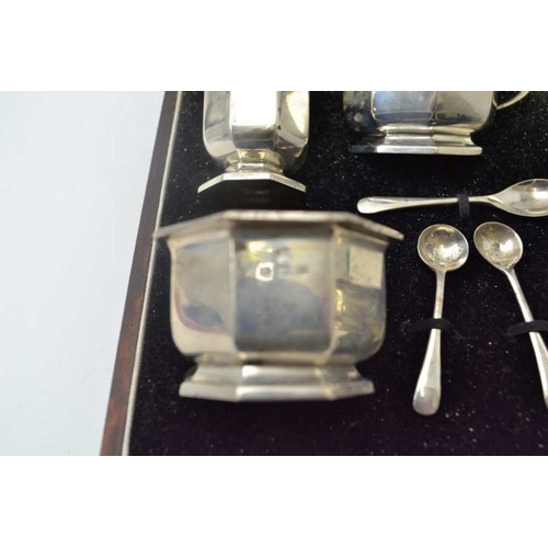 268 - William Neale & Son Ltd. A cased silver condiment set, the pieces of octagonal form, comprising; two... 