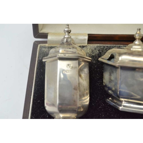 268 - William Neale & Son Ltd. A cased silver condiment set, the pieces of octagonal form, comprising; two... 