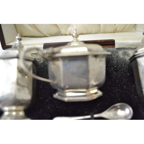 268 - William Neale & Son Ltd. A cased silver condiment set, the pieces of octagonal form, comprising; two... 