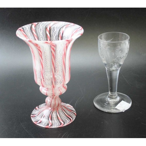 286 - A Venetian latticino flared rim goblet, 13.5cm high, together with a 19th century cordial glass, hav... 